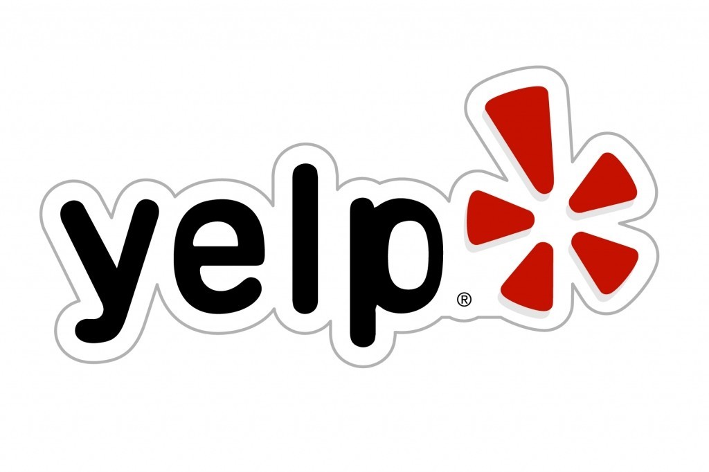 Логотип Yelp